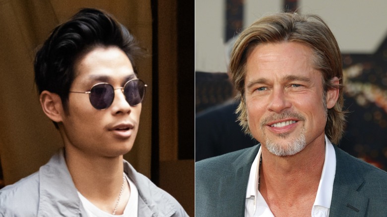 Pax Jolie-Pitt, left, and Brad Pitt, right