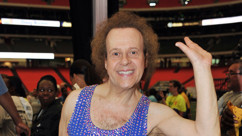 Richard Simmons blue bedazzled tank top