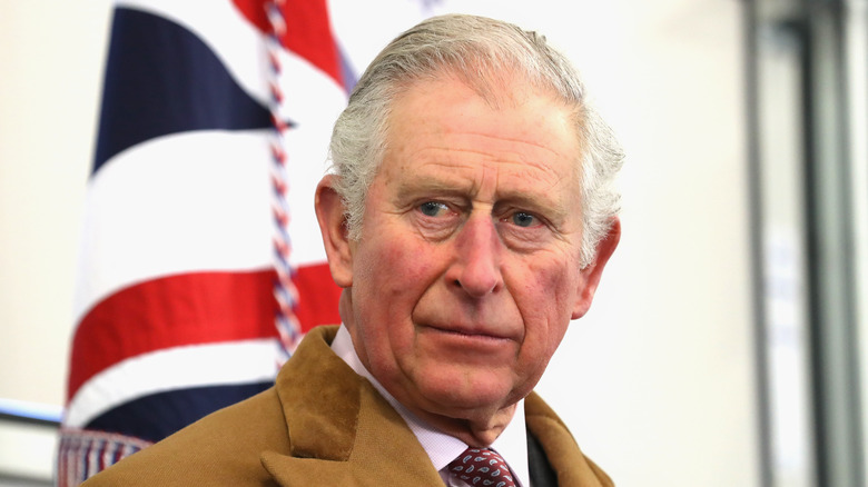 King Charles III serious British flag