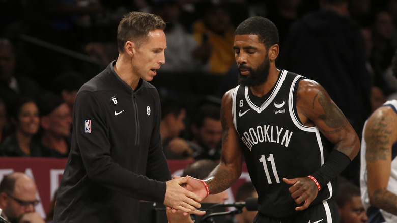 Steve Nash and Kyrie Irving shaking hands