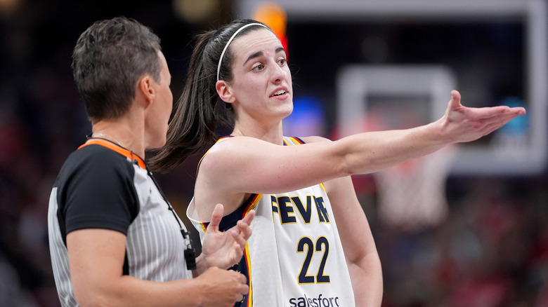 Caitlin Clark arguing with referee