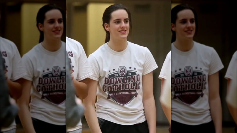 Caitlin Clark playing basketball