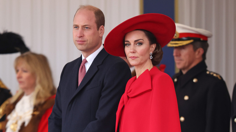 Prince William, Kate Middleton with neutral expressions