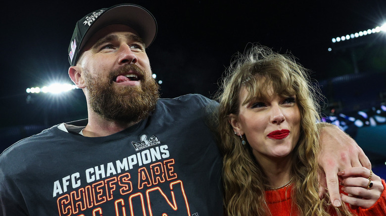 Travis Kelce and Taylor Swift celebrate together after an NFL game