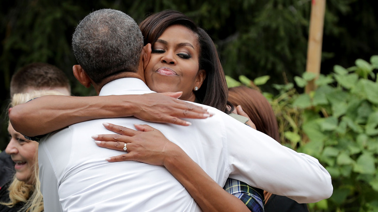 Michelle Obama hugging husband Barack