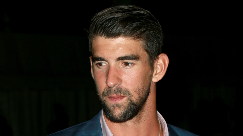 Michael Phelps looking downcast