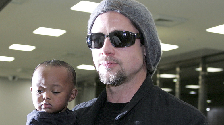 Brad Pitt and young Zahara at the airport